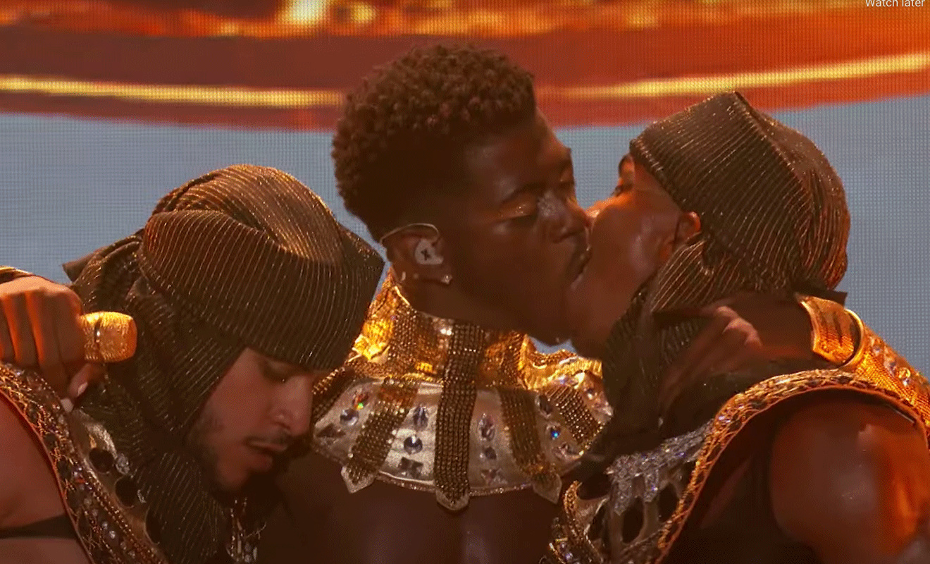Lil Nas X kisses male dancer in fiery BET Awards performance